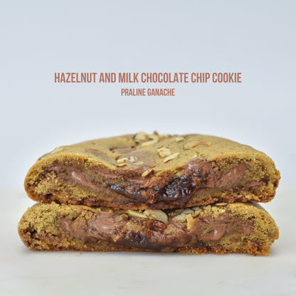 Hazelnut praline chocolate chip cookies 
Milk chocolate hazelnut ganache-stuffed cookies 
Hazelnut and praline-filled chocolate chip cookies
Praline chocolate chip cookies with hazelnuts 
Hazelnut praline ganache cookie gift box 
Milk chocolate chip cookies with hazelnut praline ganache
Gourmet praline-stuffed hazelnut cookies 
Hazelnut praline ganache sandwich cookies 
Hazelnut chocolate ganache cookie assortment 
Hazelnut praline ganache cookies with milk chocolate chips 
Hazelnut and milk chocolate chip 